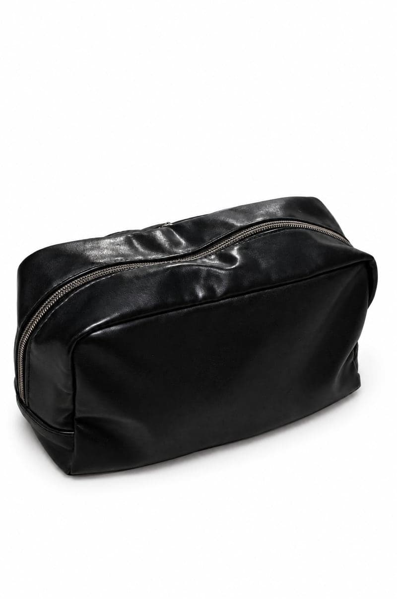 The same wash bag on pure white with a soft shadow, ready for a marketplace. AI-generated · GPT Image 2.5 Edit