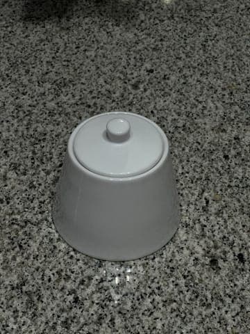 Phone photo: the sugar bowl on a granite worktop