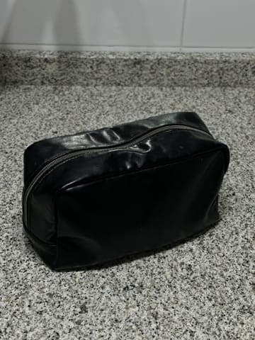 Phone photo: the wash bag on a granite worktop